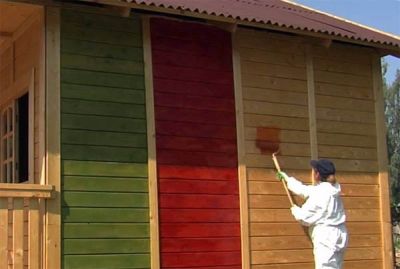 Покраска дома из бруса